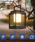 Outdoor Solar Lantern Table Lamp With Handle illuminated in rain, showing IP44 waterproof rating for patio and garden use