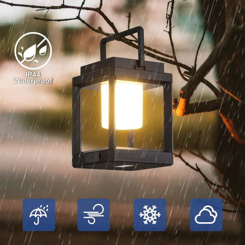 Outdoor Solar Lantern Table Lamp With Handle illuminated in rain, showing IP44 waterproof rating for patio and garden use