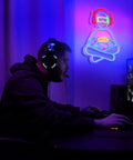 Gamer playing at computer with Gamer Neon Sign For Wall Decor 3D Dimmable USB Powered With 8 Modes Control on wall. Game Zone Decor.