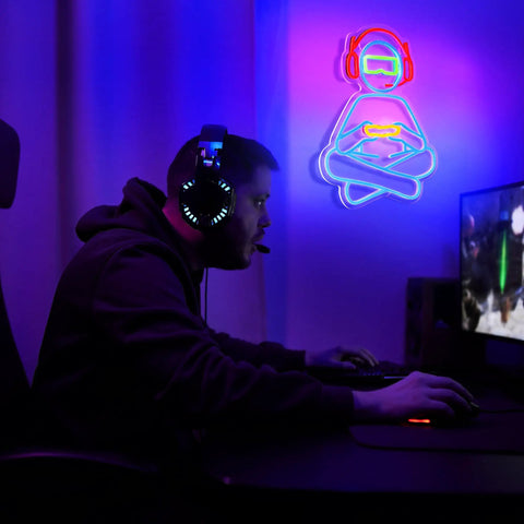 Gamer playing at computer with Gamer Neon Sign For Wall Decor 3D Dimmable USB Powered With 8 Modes Control on wall. Game Zone Decor.