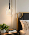 Kveosv 2 Pack Kitchen Island Pendant Lights, 8" Clear Glass Shade Black Modern Farmhouse Industrial Pendant Light Fixtures above bedside table.