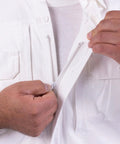 Men's Long Sleeve Poplin Tactical Shirt White with hidden zipper placket being zipped up by a hand.
