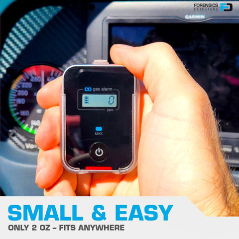 Person holding Fleet-Ready Carbon Monoxide Detector For Cars Planes Buses And Trucks With Fast Low-Level 9ppm Alarm And 25ppm Safety Threshold