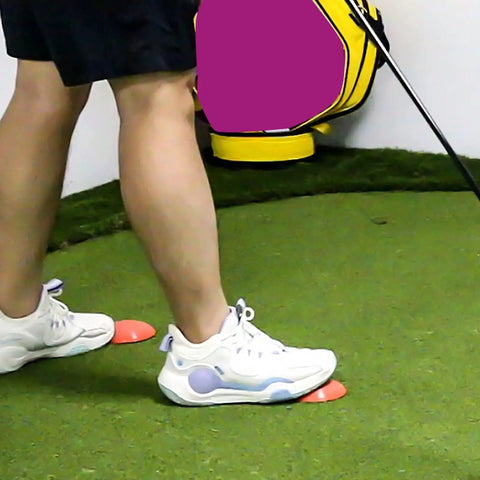 Golf Force Pedal Training System for Swing Power and Balance with a Rubber Pedal Exerciser Step Pad in use on green turf