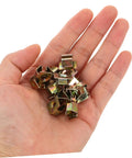 Heavy Duty 50 Pack Golden Iron Captive Nut Car Body Clips Street Tough Bumper Retainers And License Plate Fasteners in hand.
