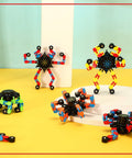Colorful 40 Pack Funny Sensory Fidget Toys Set Transformable Chain Robot Finger Toys DIY Deformation Spinners on display table