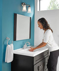 Eva 2 Light Dual Mount Bath Vanity Fixture With Frosted Glass In Brushed Nickel Finish above modern sink area