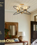 Black And Gold Industrial Ceiling Light Fixture With Four Light Candle Chandelier Ceiling Mount For Dining Room Kitchen Island Living Room And Bedroom E12 Sockets Vintage Style Home Lighting, in entryway with mirror and lamp.