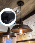 Close-up of black 35Pcs Thread Cap Hex Knob Set M3 to M12 used in light fixture fastening, shown on ceiling lamp