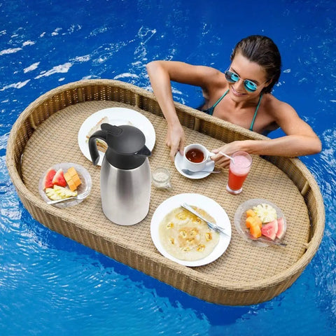 Double Walled Stainless Steel Thermal Coffee Carafe 68-Ounce Two-Liter Capacity Dispenser on floating tray in pool