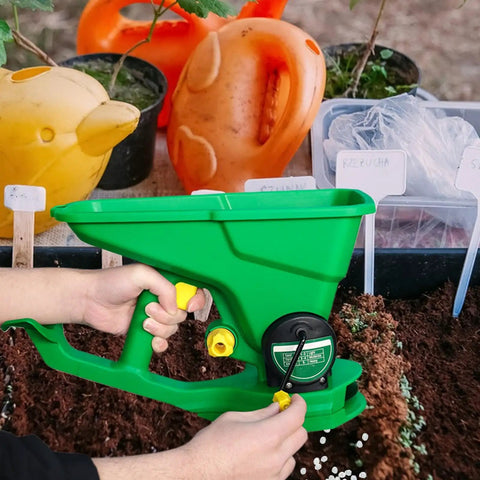 Cordless Handheld Seed And Fertilizer Spreader With Adjustable Feed Rate Portable Broadcast Spreader in garden setting