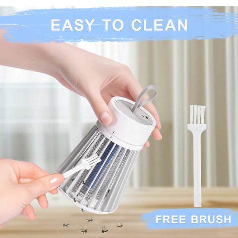 Rechargeable Indoor And Outdoor Insect Killer With UV Light being cleaned with included brush