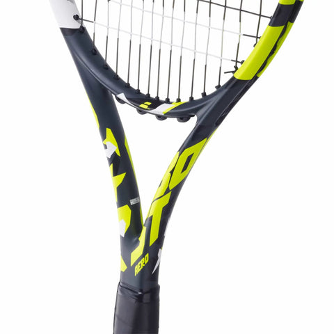 Close-up of Boost Aero Yellow Tennis Racquet Pre Strung With White Syn Gut At Mid Range Tension One Quarter Inch Grip Lightweight