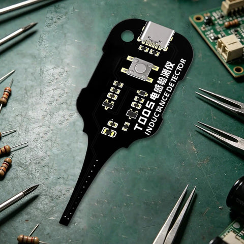 Top view of a Coil Pack Inductance Tester For PCB With Indicator Lights, surrounded by electronic components and tools.