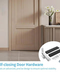 Double Action Spring Hinge With Cover Plates For Wood Doors Self Closing Door Hardware shown with wooden door and accessories.