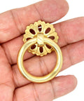Close-up of a Set Of 6 Vintage Gold Brass Ring Pulls With Hollow Dome Base Flower Like Design For Cabinets