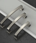 10 Pack 5 Inch Cabinet Handles Brushed Satin Nickel Center To Center 128mm Pulls lying on a counter