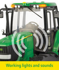 Close-up of One Sixteenth Scale Big Farm 7430 Tractor Toy showing working lights and sounds in realistic farm playtime setup