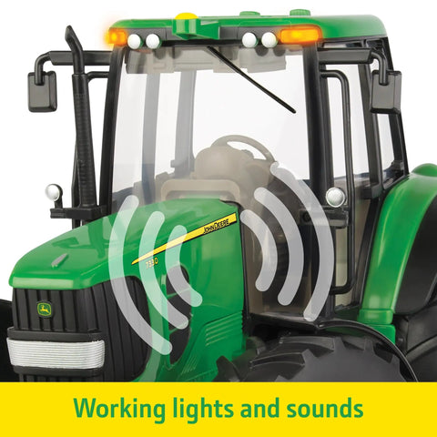 Close-up of One Sixteenth Scale Big Farm 7430 Tractor Toy showing working lights and sounds in realistic farm playtime setup