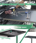 Pro Grade Adjustable Height Rolling Work Table On Wheels With Heavy Duty Steel in use with wrenches and tools on workbench.