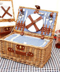 Open large wicker picnic basket set with waterproof blanket, full cutlery kit, and wine glasses for lakeside picnics