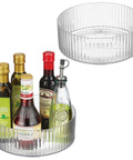 Two Pack Fluted Lazy Susan Plastic Spinner Turntable For Kitchen Counter Organizing Rotating Organizer Swivel Tray For Spices And Accessories 9 Inch Round Clear Sturdy Build with olive oil bottles.
