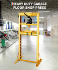 Tough As Nails 12 Ton Hydraulic Shop Press Featuring H Frame Design With Adjustable Height Worktable And Rugged Steel Plates in workshop.