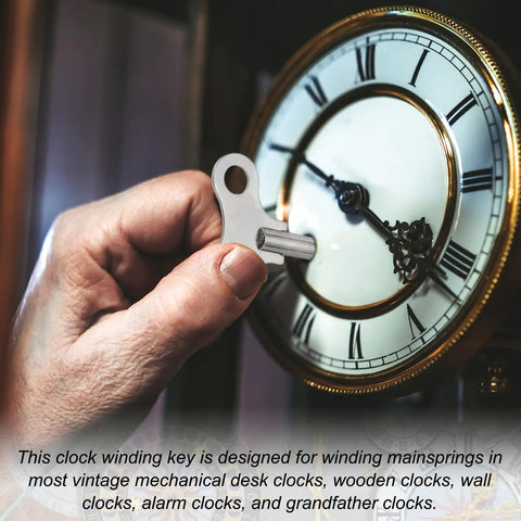 Person using Gearhead Favorite Wrench Clock Key For Winding Mechanical Clocks, 4.4mm Hole, 52mm Long Steel Clock Key