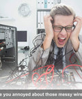 Stressed man in a suit with tangled wires around him, highlighting the need for 20 Pack Heavy Duty Black Desk Grommets And Cable Hole Cover Caps For No Sweat Cable Management With A Snazzy Home Office Setup Solid Plastic Wire Grommets Keep Desks Sleek And Totally On Point.
