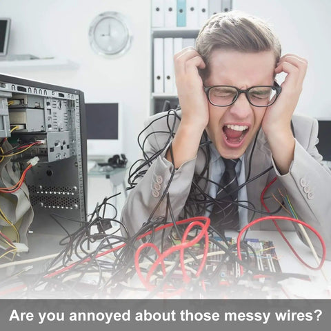 Stressed man in a suit with tangled wires around him, highlighting the need for 20 Pack Heavy Duty Black Desk Grommets And Cable Hole Cover Caps For No Sweat Cable Management With A Snazzy Home Office Setup Solid Plastic Wire Grommets Keep Desks Sleek And Totally On Point.
