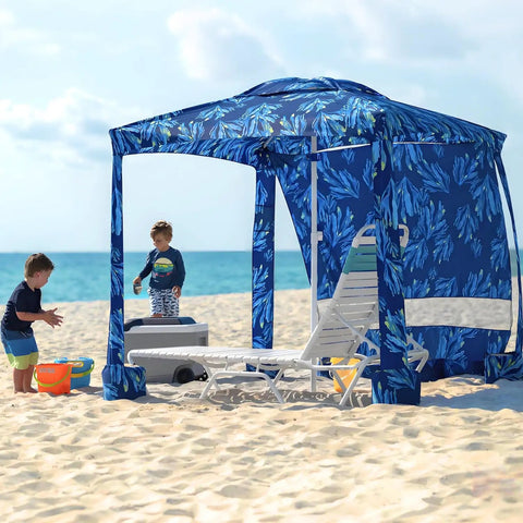 Beach Cabana Canopy 6.5 Feet By 6.5 Feet, Easy Set Up And Take Down, Portable Sun Shade With Sand Pockets And Side Wall, Water Resistant Beach Shelter In Coral Tropical on a sandy beach with children playing nearby.