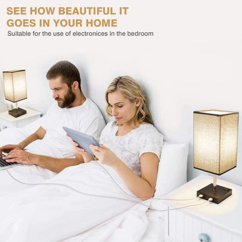 Couple in bed using Black Nightstand Lamps 2 Pack with Touch Dimming AC Outlet and Dual USB Ports Fabric Shade Bedside Lamps