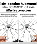 Using an eight-opening hub wrench on a bicycle wheel spoke, part of the 5-Piece Universal Bicycle Spoke Wrench Set With Tire Lever.