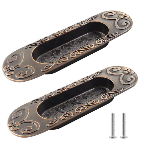 Two Pack 4.13 Inch European Recessed Flush Pull Handle Set In Stainless Steel With Antique Copper Finish, decorative design visible.