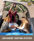 Family inside Zeta C6 Pro Six Person Instant Cabin Tent With 60 Second Setup, enjoying advanced venting system, khaki color.