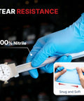 Heavy Duty 6 Mil Blue Nitrile Work Gloves With Rock Solid Textured Grip For Mechanics And Auto Shops, Powder Latex Free Tear Resistant Daily Grind Hand Armor, 100 Pack Xx Large, shown being worn while measuring.