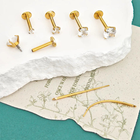 4 Pairs 16G Flat Back Stud Earrings Set in Hypoallergenic Surgical Steel With Four Sizes 2mm 3mm 4mm 5mm And Pin Lengths 6mm 6mm 7mm 8mm gold