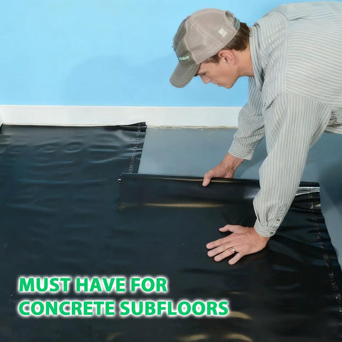 Person installing Heavy Duty Black Underlayment Roll With Adhesive Strip For Vinyl Laminate Engineered Wood Floors 6 Mil thick over concrete subfloor.