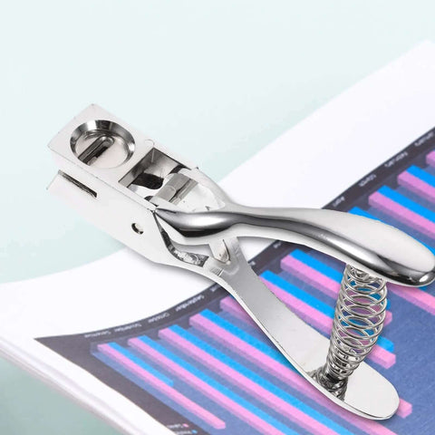 Go To Portable Manual Oval Hole Puncher For Home And Office Use Single Hole Punch With 8 Sheet Capacity in silver metal on paper