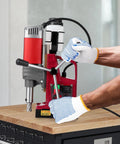 Heavy Duty Magnetic Drill Press With 1550W Motor, 1.57 Inch Capacity in use on a workbench, displaying 10 speed adjustable controls.