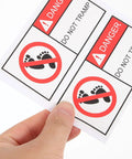 Hand holding Self Adhesive Warning Sign Stickers PVC Material 2 Pack with DO NOT TRAMP caution