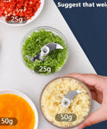 USB Rechargeable Electric Mini Garlic Chopper 100Ml Cordless Food Processor with minced veggies in containers.