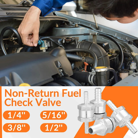 Mechanic installing inline fuel check valves set in engine