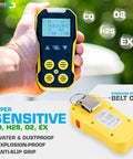 NIST Traceable 4 Gas Monitor With O2, CO, H2S And LEL being held, showing front display and yellow durable casing