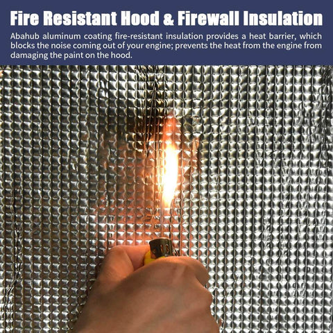 Hand holding lighter against Heavy Duty Automotive Heat Shield Insulation Roll for fire resistance test, focus on reflective foil surface.