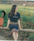 Grass Scythe With Manganese Steel Blade And Long Handle For Easy Weeding And Lawn Care, woman sitting by a field.