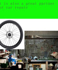 heavy-duty oil seal removal tool in a workshop setting with bicycle wheel