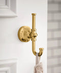 Colinet Double Robe Hook In Brushed Gold For Bath And Kitchen, Everyday Luxury Vibe installed on white wall holding towel