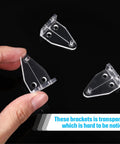 Crystal Clear Window Blind Hold Down Brackets No Sweat Mini Plastic Tension Clips For Roller Shades And Blinds Quick Setup set of three clips in hand on black background.