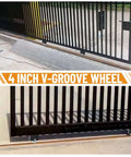 4 Inch V Groove Gate Wheel With Weld On Box, Beefy Sliding Gate Wheel Set under black metal sliding gate, close view, 2 Pack